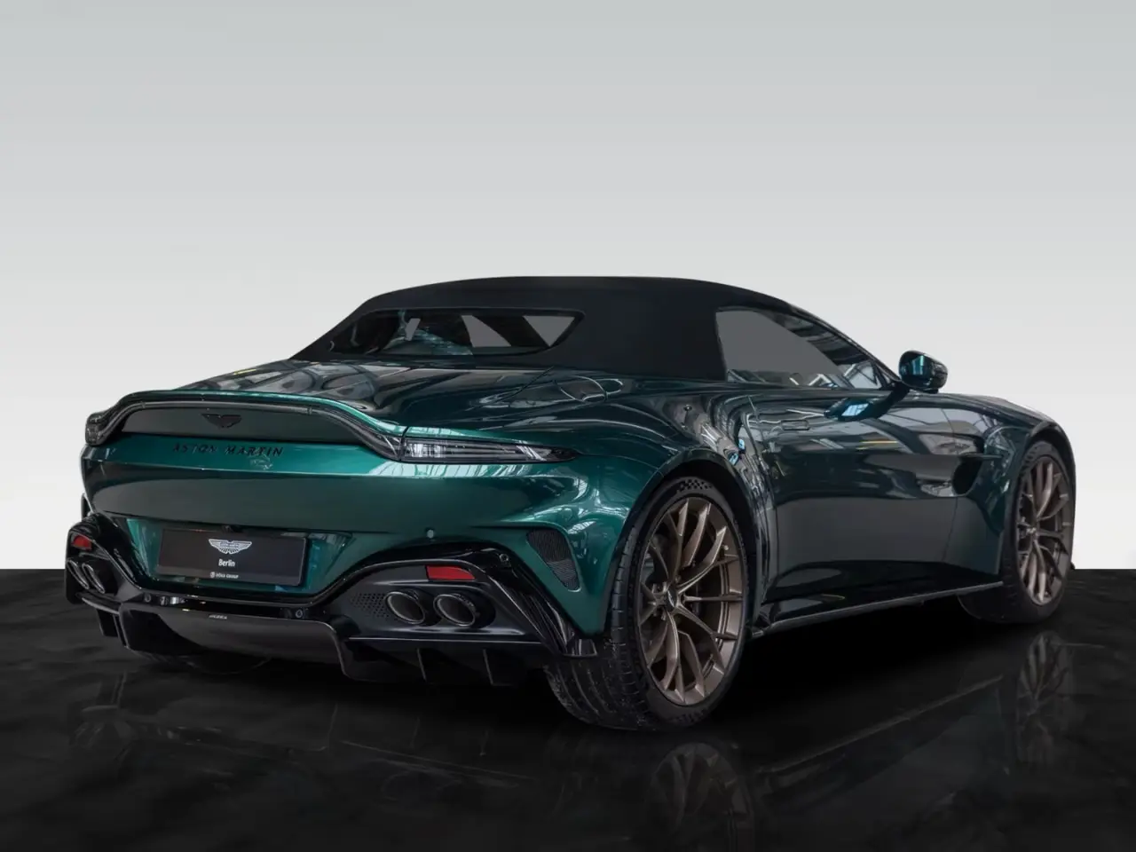 Aston Martin Vantage V8 Spider 2026, rear view — Luxury Car Rental Switzerland, Switzerland. Aston Martin Vantage V8 Spider in Switzerland The Aston Martin Vantage V8 Spider is…