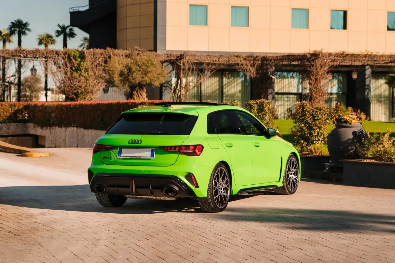 Audi RS3 Restyling 2025, rear view — Luxury Car Rental Switzerland, Switzerland. Audi RS3 Restyling in Switzerland The Audi RS3 Restyling, model year 2025, is available…