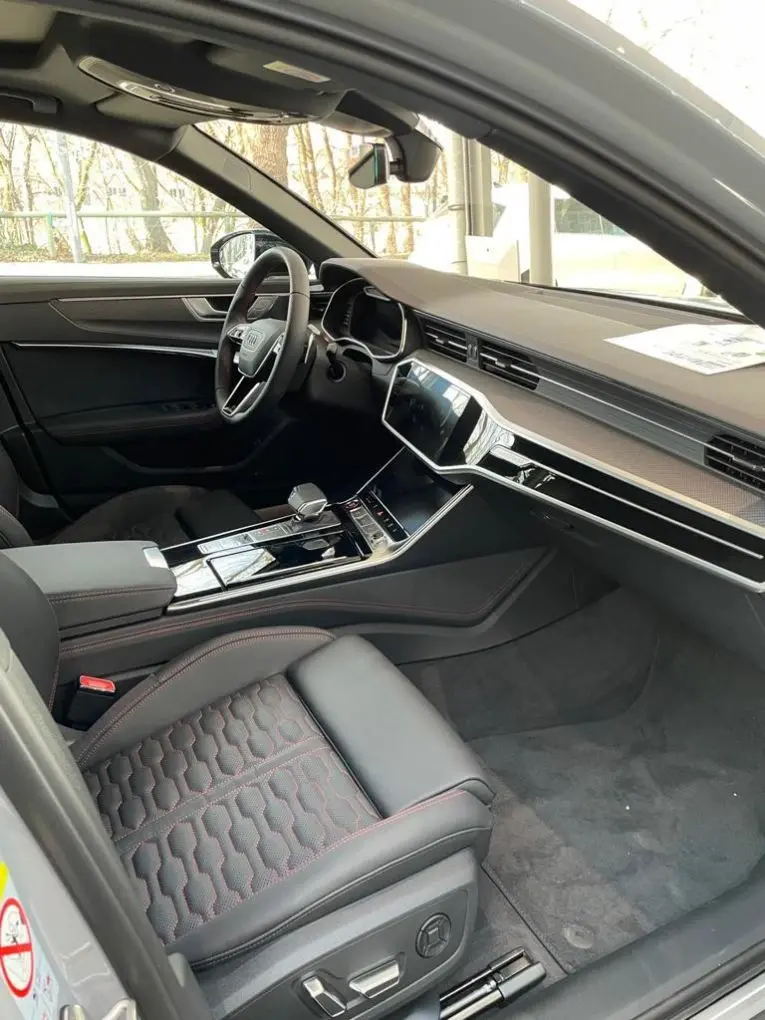 Audi RS6 Dynamic 2023, rear view — Luxury Car Rental Switzerland, Switzerland. Audi RS6 Dynamic in Switzerland The Audi RS6 Dynamic, model year 2023, is available for…