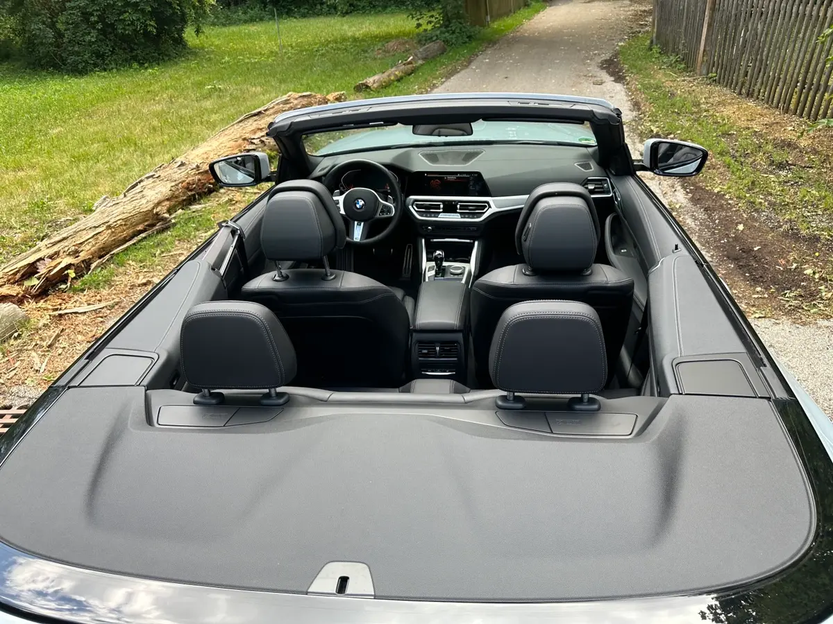 BMW 430i Cabrio 2023, rear view — Luxury Car Rental Switzerland, Switzerland. BMW 430i Cabrio in Switzerland The BMW 430i Cabrio is available for rental in Switzerland…