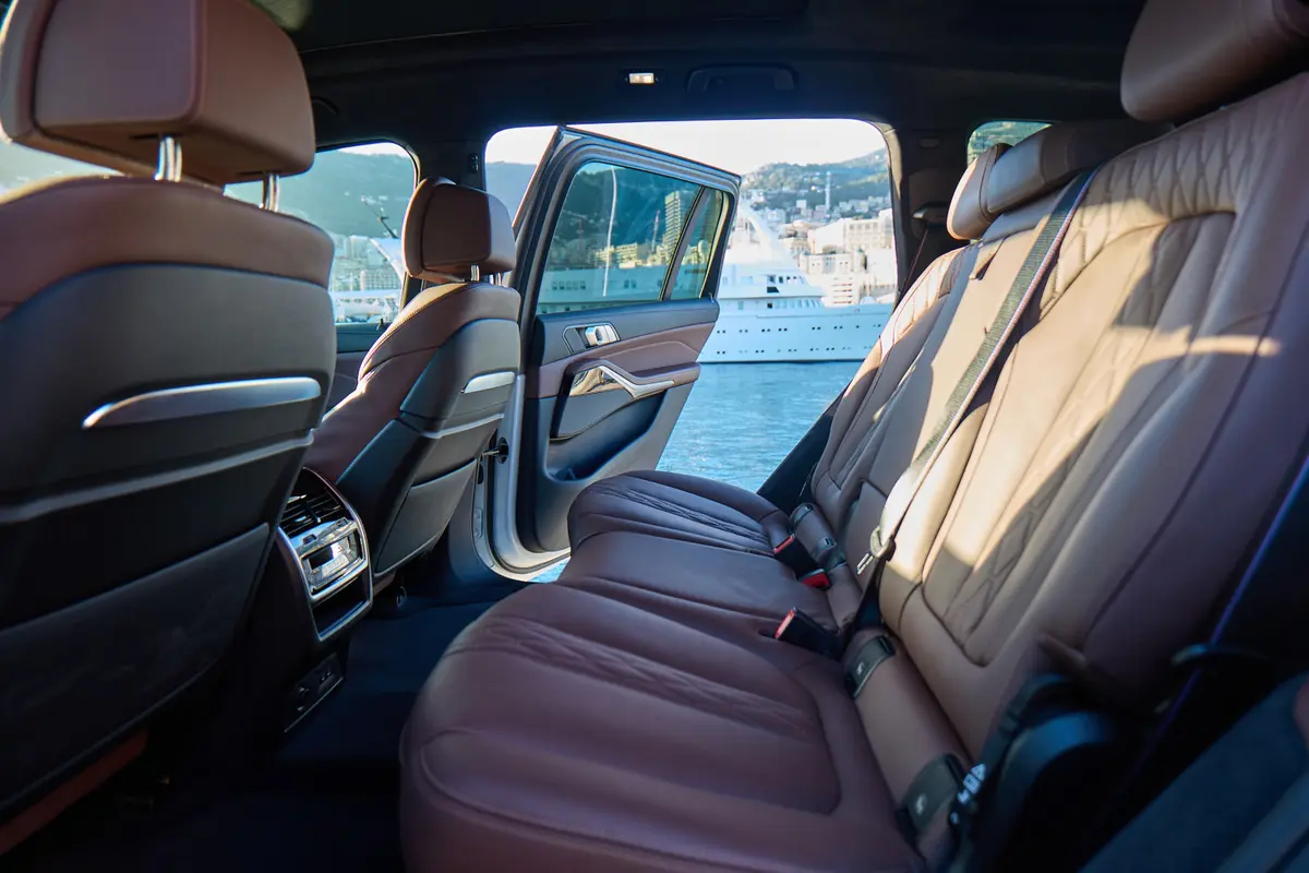 BMW X7 40d M 2024, rear view — Luxury Car Rental Switzerland, Switzerland. BMW X7 40d M in Switzerland The BMW X7 40d M, model year 2024, is available for rental in…