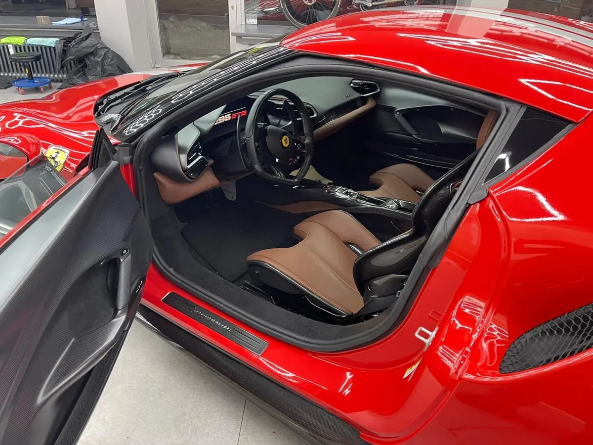 Ferrari 296 GTB 2023, rear view — Luxury Car Rental Switzerland, Switzerland. Ferrari 296 GTB in Switzerland The Ferrari 296 GTB is available to rent in Switzerland…