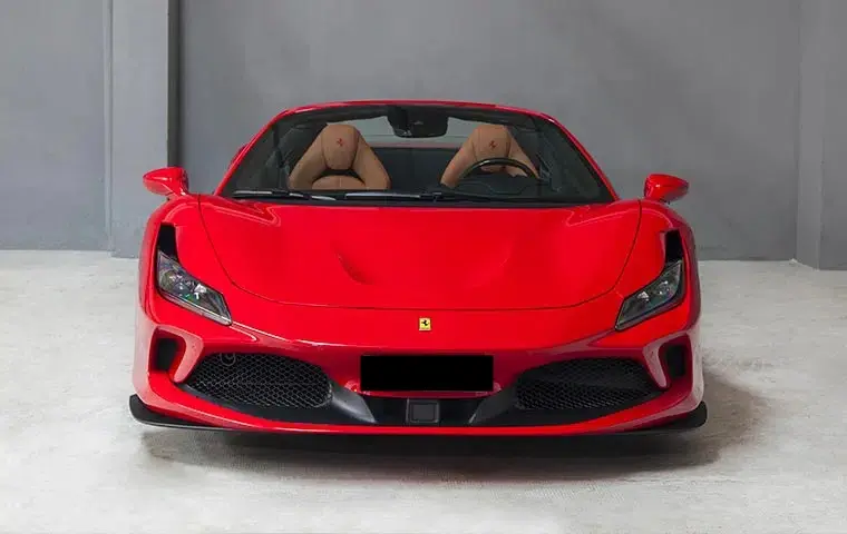 Ferrari F8 Tributo Spider Red 2023, front view — Luxury Car Rental Switzerland, Switzerland. Ferrari F8 Tributo Spider Red in Switzerland The Ferrari F8 Tributo Spider Red, model…