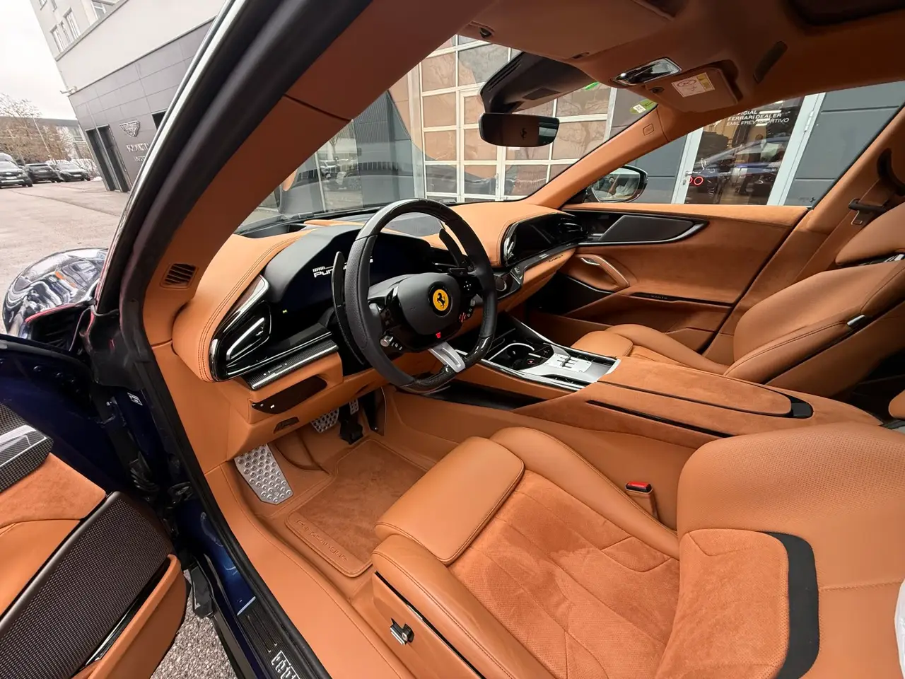 Ferrari Purosangue 2024, rear view — Luxury Car Rental Switzerland, Switzerland. Ferrari Purosangue in Switzerland The Ferrari Purosangue 2024 is available to rent in…