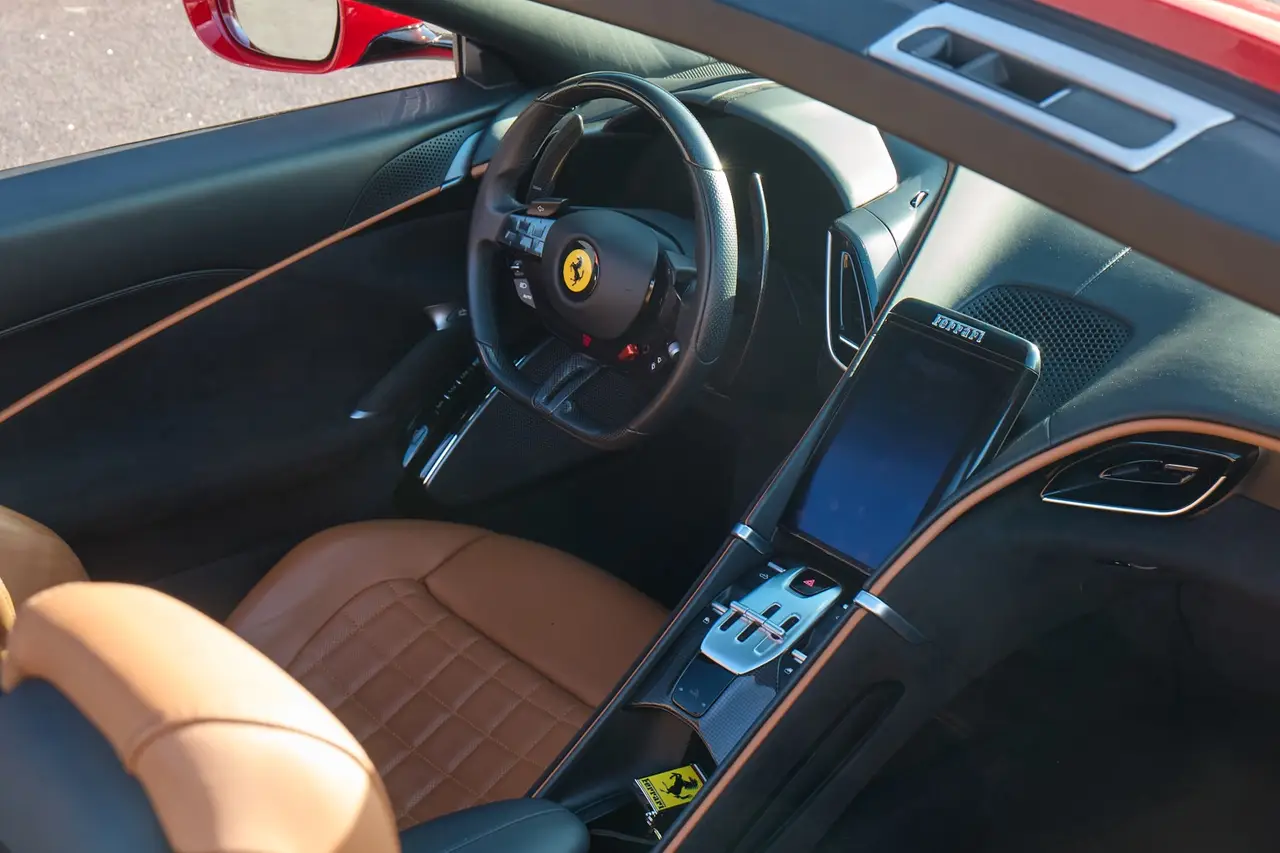 Ferrari Roma Spider 2024, rear view — Luxury Car Rental Switzerland, Switzerland. Ferrari Roma Spider in Switzerland The Ferrari Roma Spider 2024 is available for rental…
