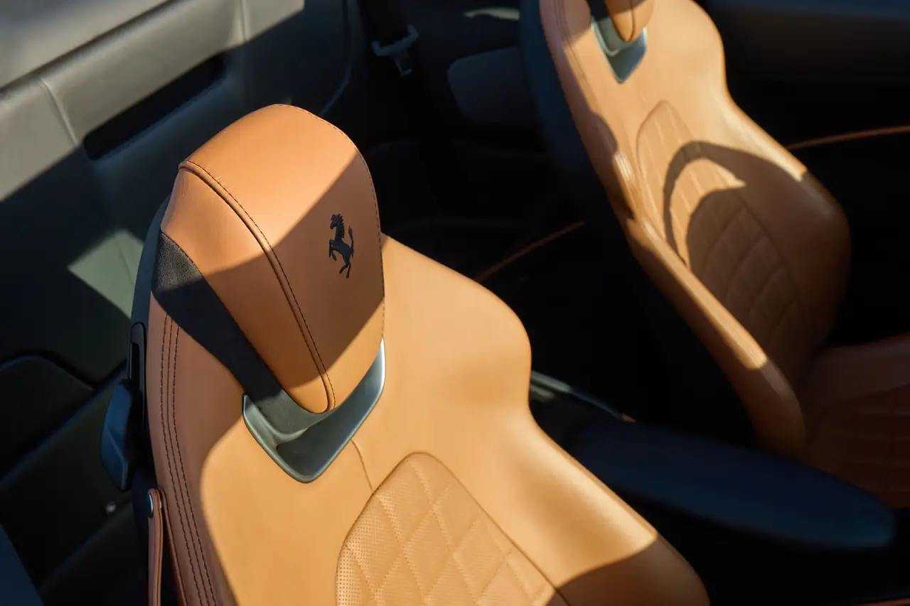 Ferrari Roma Spider 2024, interior — Luxury Car Rental Switzerland, Switzerland. Ferrari Roma Spider in Switzerland The Ferrari Roma Spider 2024 is available for rental…