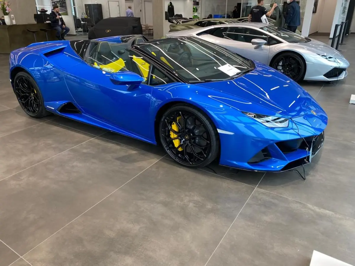 Lamborghini Huracan Evo Spyder 2022, front view — Luxury Car Rental Switzerland, Switzerland. Lamborghini Huracan Evo Spyder in Switzerland The Lamborghini Huracan Evo Spyder, year…