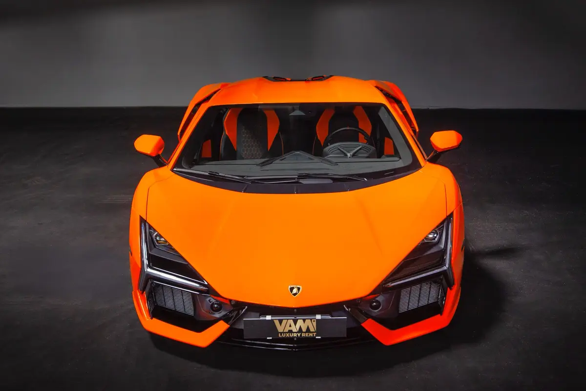 Lamborghini Revuelto 2026, rear view — Luxury Car Rental Switzerland, Switzerland. Lamborghini Revuelto in Switzerland The Lamborghini Revuelto 2026 is available to rent in…