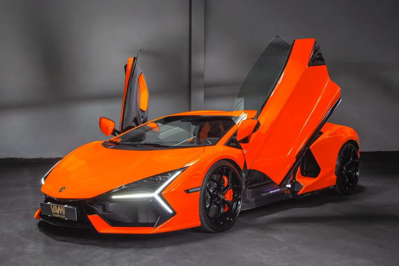 Lamborghini Revuelto 2026, side profile — Luxury Car Rental Switzerland, Switzerland. Lamborghini Revuelto in Switzerland The Lamborghini Revuelto 2026 is available to rent in…