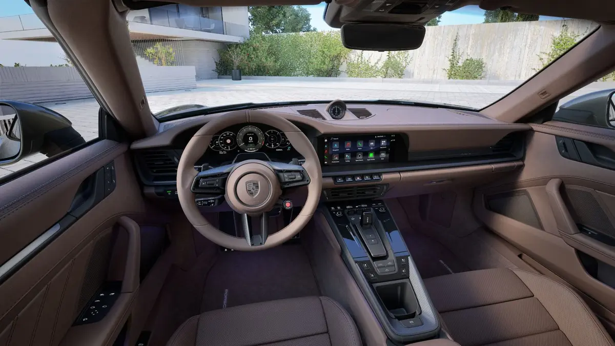 Porsche 911 992 Carrera Turbo S Cabrio 2026, rear view — Luxury Car Rental Switzerland, Switzerland. Porsche 911 992 Carrera Turbo S Cabrio in Switzerland The Porsche 911 992 Carrera Turbo S…