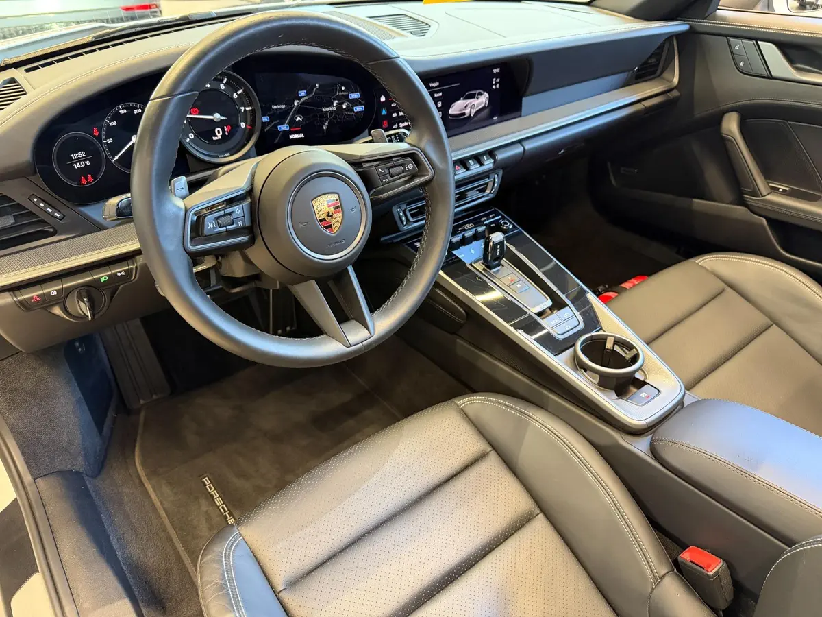 Porsche 911 Carrera S Cabrio (992) 2025, front view — Luxury Car Rental Switzerland, Switzerland. Porsche 911 Carrera S Cabrio (992) in Switzerland The Porsche 911 Carrera S Cabrio (992)…
