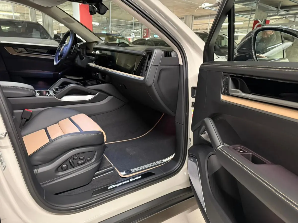 Porsche Cayenne Turbo E-Hybrid Coupé GT 2026, rear view — Luxury Car Rental Switzerland, Switzerland. Porsche Cayenne Turbo E-Hybrid Coupé GT in Switzerland The Porsche Cayenne Turbo E-Hybrid…